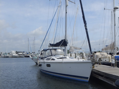 A Hunter 410 sailboat docked